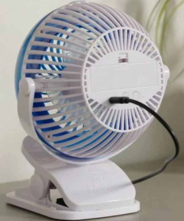 Go Fan Portable Cooling Fan Mist USB Rechargeable, in white and blue, with a clip-on base and a central misting nozzle.