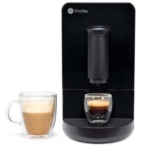 A black GE Profile automatic espresso machine next to two glass mugs, one with a latte and the other with a fresh espresso shot.